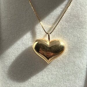Gold plated heart charm with 10k gold chain.